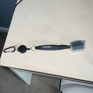 Black Club Brush with Retractable Clip